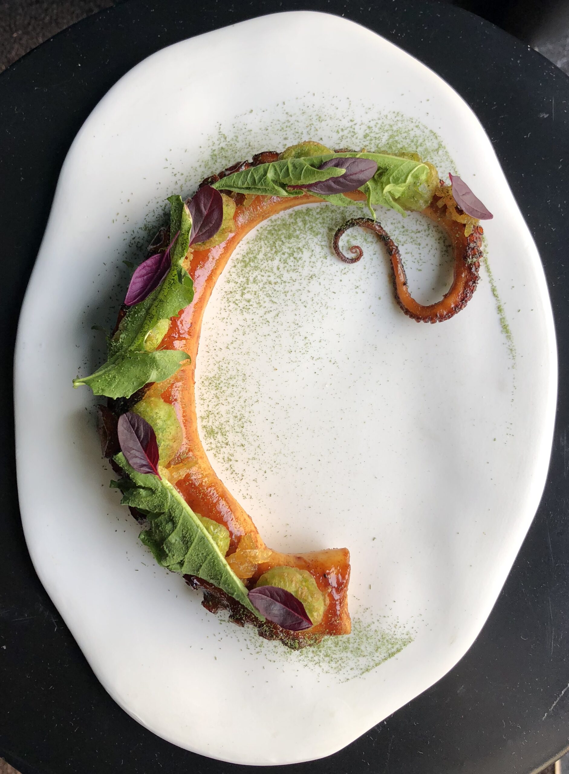 A plated gastronomic course from a Pr&eacute;mices private dinner on the Cap