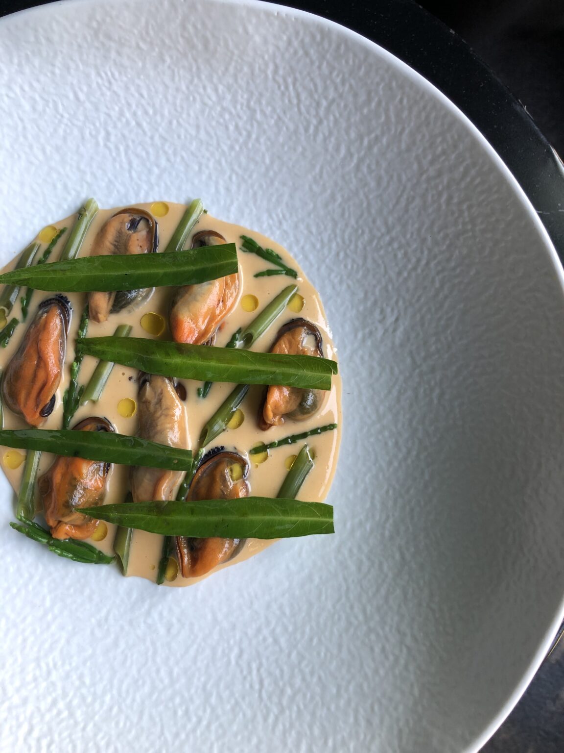 A plated course from a Pr&eacute;mices private dinner, cooked at a starred level