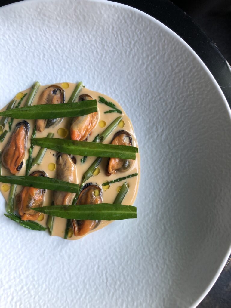 A shellfish course composed by a Prémices chef for a private Paris dinner